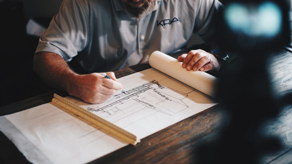 Architect working on drawings